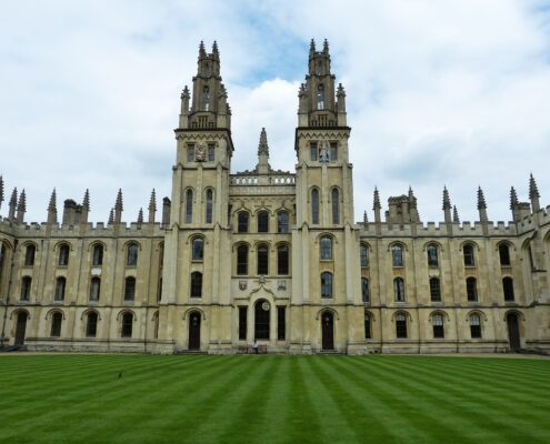 Oxford university collage building with grass lawn